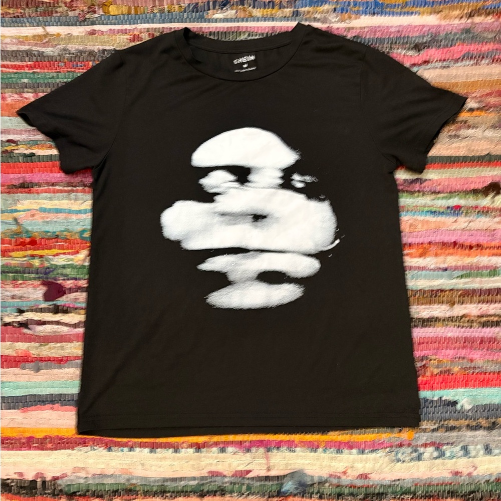 Chic Black Tee with White Artistic Print